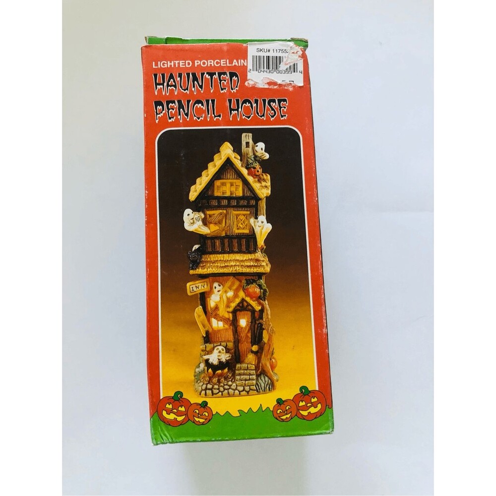 Haunted pencil orange light porcelain house 8”x3”
